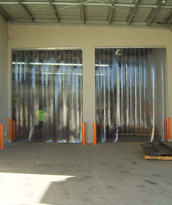 Comparing Solutions: PVC Strip Curtains vs. Traditional Doors